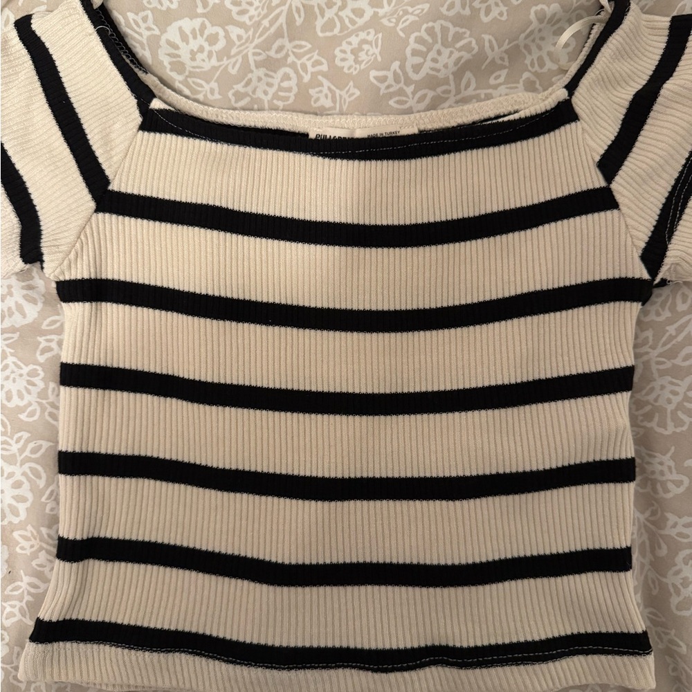 Black stripped off the shoulder top